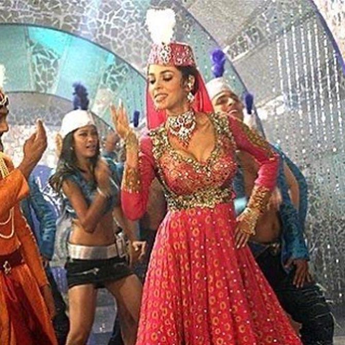 In the other post, Mallika Sherawat was seen wearing an embellished Anarkali outfit. Sharing a trivia, the actress wrote, 