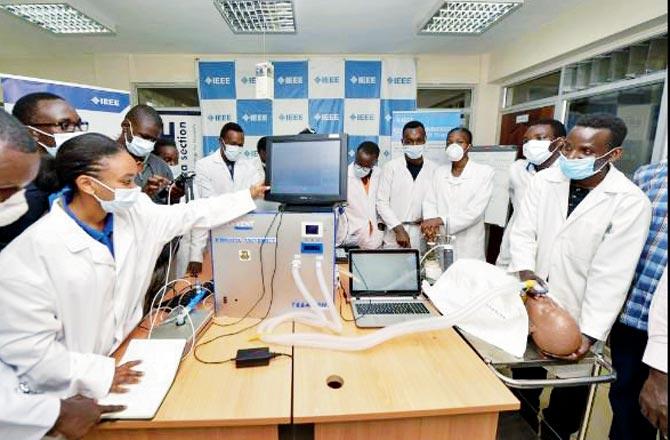 Medical students test a ventilator prototype. Pic/AP
