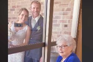 Heartwarming video shows bride visiting grandmother on wedding day