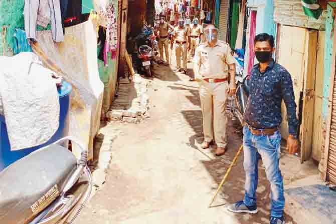 Cops make the rounds of slum areas every day