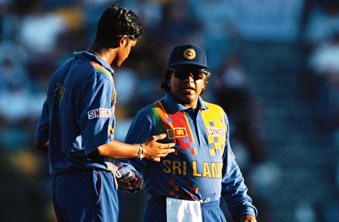 Sri Lanka captain Arjuna Ranatunga (right) with pacer Nuwan Zoysa during an ODI against England at Brisbane in 1999. Pic/Getty Images