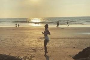 Malaika Arora shares throwback boomerang spinning on beach with positive message