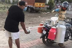 Coronavirus: Netizens praise milkman's technique for supplying milk