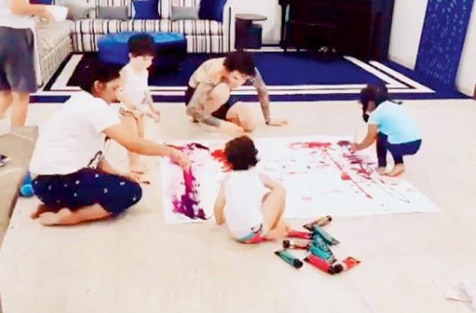 The family takes to activities like painting to keep themselves engaged. Pics/Instagram