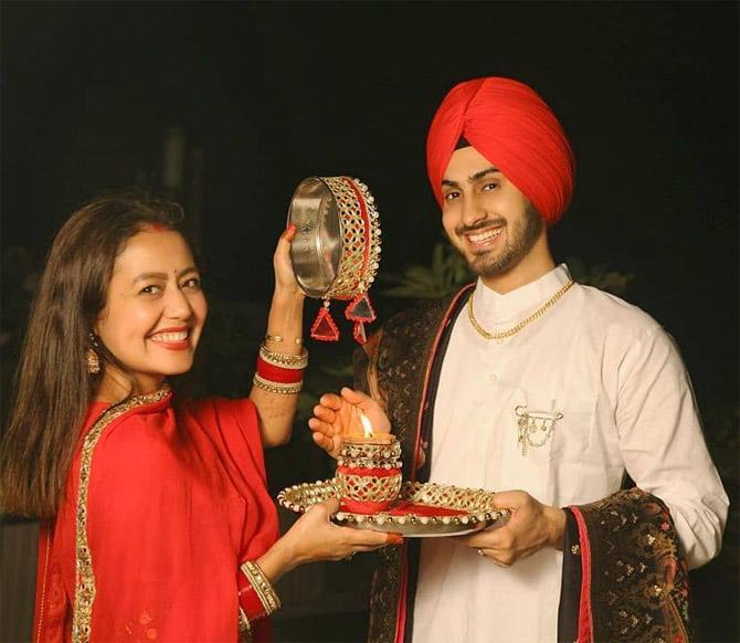 Neha Kakkar observed her first Karva Chauth for her husband singer Rohanpreet Singh. She took to Instagram, where she posted loads of photographs of herself along with Rohan and captioned it: 