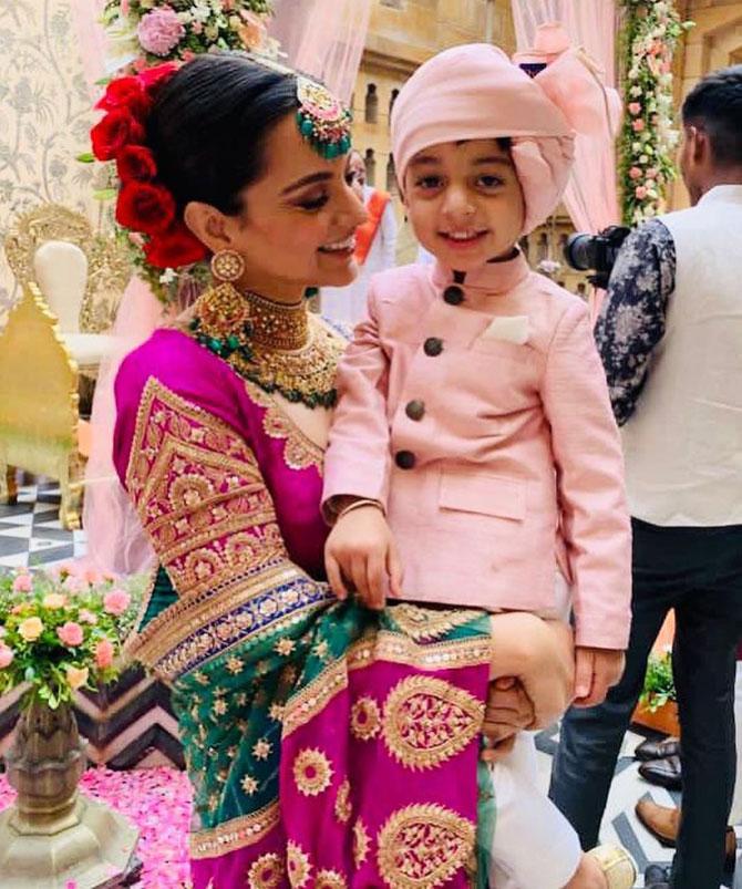 Aunt-nephew duo - Kangana Ranaut with little Prithvi were all smiles, as they get clicked at one of the pre-wedding events.