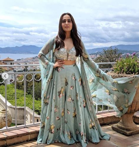 Lehenga: Try this floral lehenga with a statement ring and loose hair, finish the look with barely-there makeup
