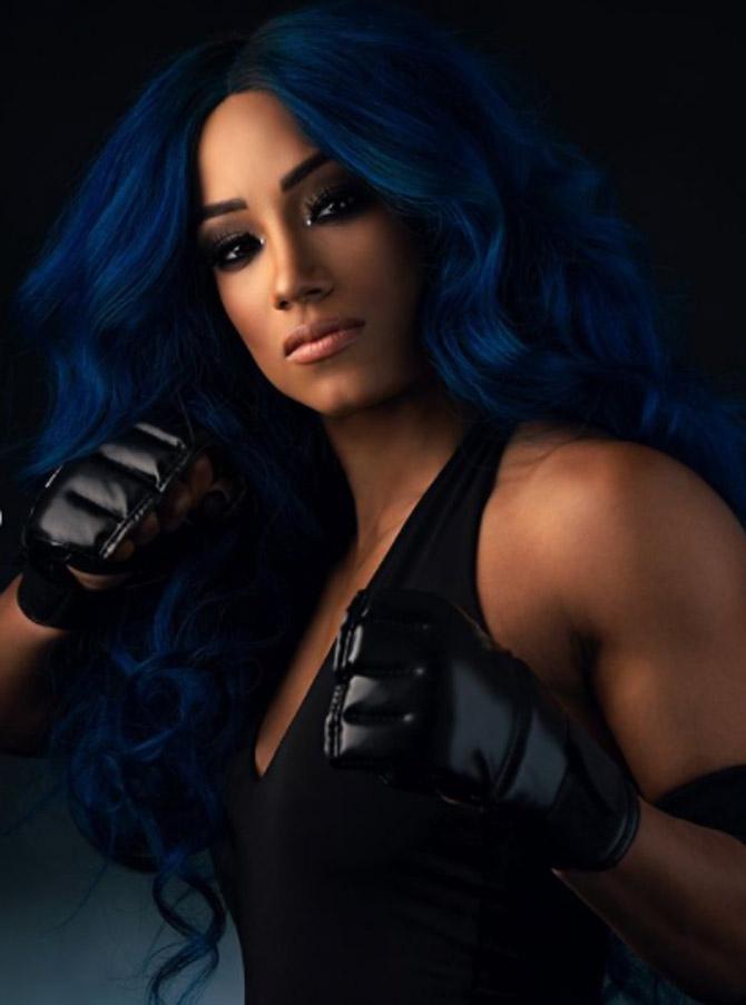 Sasha Banks has also won the Raw women's title and women's tag-team titles before which makes her a Grand Slam champion.