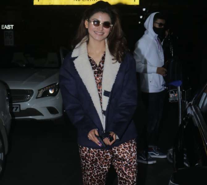 Urvashi Rautela sizzled in her leopard printed dress and a black sweater when snapped at the airport. A pair of black sunglasses enhanced her look. She kept her hair open, which completed her look.