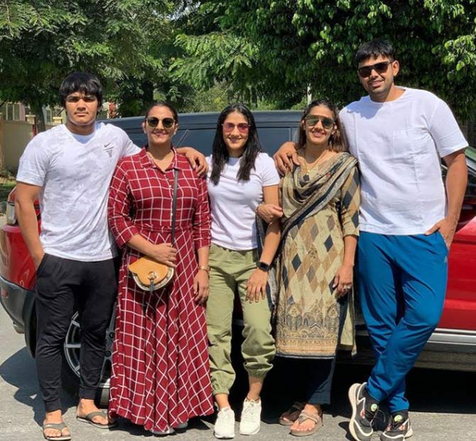 The early life of the Phogat family was been showcased in the Bollywood blockbuster movie Dangal in 2016. In the film, Sanya Malhotra portrayed the role of Babita Phogat, Fatima Sana Shaikh played the role of Geeta Phogat while Aamir Khan played the role of their father Mahavir Singh Phogat.