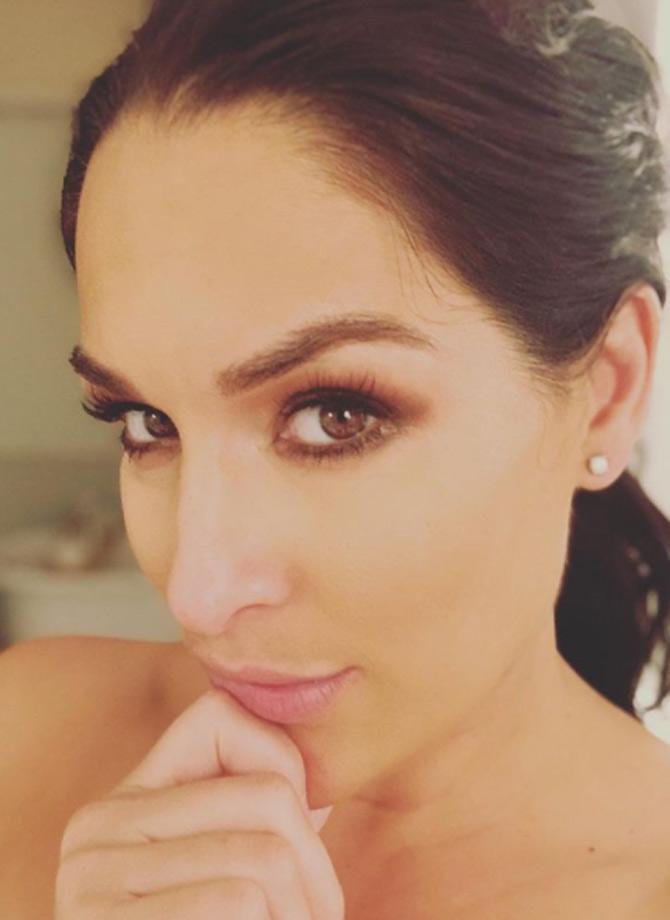 Before dating John Cena, Nikki Bella was in a relationship with another WWE wrestler, Dolph Ziggler.