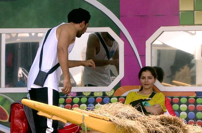 Friday saw a major controversy between Jasmin and Rubin. When Abhinav allowed Nikki to sleep inside the house as she is unwell, little did he know the can of worms that he was opening! Nikki went inside to sleep and started collecting the makeup stuff to which she did not had access. Eijaz, Abhinav, and Rubina asked her to leave the sleeping area on account of her actions, but Nikki remained unfazed. She brazenly defied each and every house member including her friend Pavitra and refused to move!