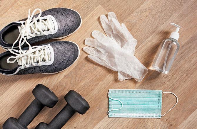 Wear gloves while using gym equipment and carry your own bottle and sanitiser, apart from mask
