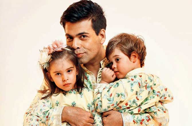 Karan Johar, who has authored the book, with his twins, Yash and Roohi