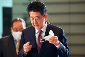 Japan ex-PM's office probed over funding scandal