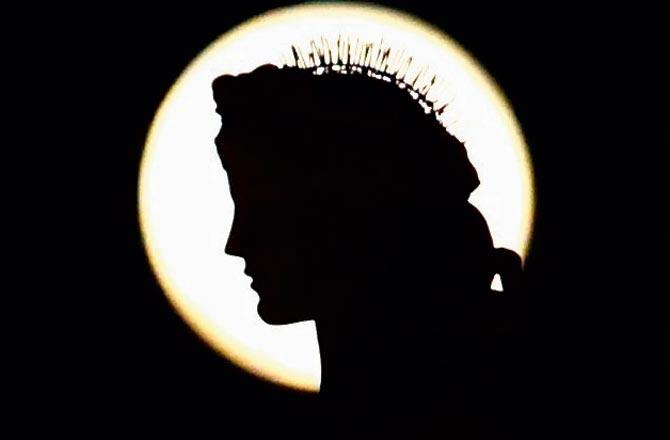 Silhouetted against a full moon. File pics