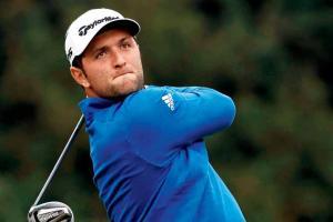 Jon Rahm grabs share of Masters lead while Tiger Wood's hopes alive