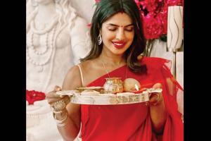Priyanka Chopra is radiant in red as she celebrates with Nick Jonas