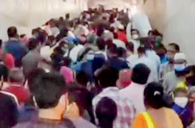 Bandra terminus witnessed a huge crowd of passengers waiting to be tested as two express trains arrived within 10 minutes of each other on Wednesday. Pics/Shadab Khan, Satej Shinde and Rajendra B. Aklekar