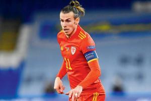 Bale's brilliance ensures Wales flatten Finland to gain promotion