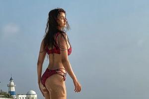 Disha treats fans with stunning bikini pictures from her beach outing