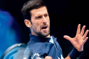 Novak Djokovic defeated but happy over being No. 1