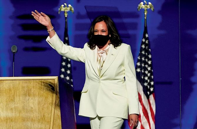 Vice President-elect Kamala Harris waves as she takes the stage before speaking on Saturday. Pics/AFP