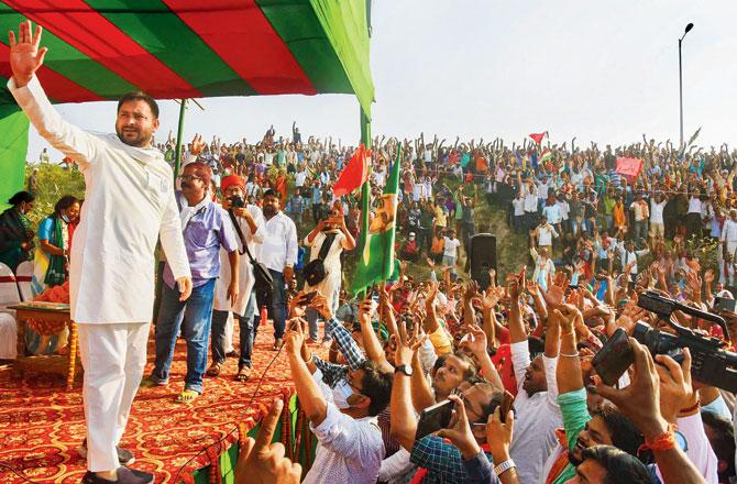 RJD leader Tejashwi Yadav addresses an election rally at Digha in Patna, on Sunday. Pics/PT