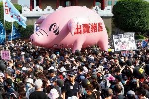 Thousands in Taiwan march against US pork imports