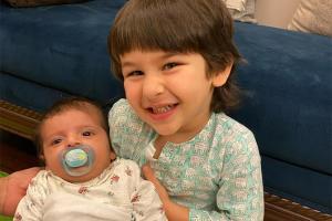 See Post: Taimur Ali Khan strikes a pose with a baby; both look lovable