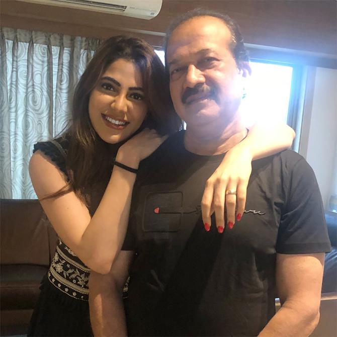 That's Nikki's father Digambar Tamboli. He works as a sales executive in a nationwide acclaimed bank. Sharing this adorable picture with her dad on Instagram, Nikki captioned it, 