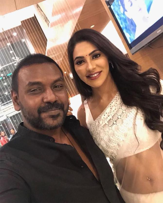 After Chikati Gadilo Chithakotudu, Nikki made her Tamil debut with Kanchana 3 (the fourth instalment in the Muni Franchise and third instalment in Kanchana series).
In picture: Nikki Tamboli with Kanchana 3 co-star Raghava Lawrence. She played Raghava's cousin in the film.