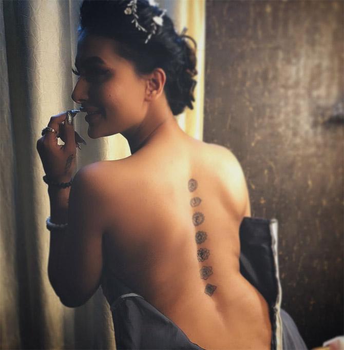 Pavitra Punia loves tattoos and has a lot of them inked on her body. The actress is said to have 5 tattoos, a rose on her finger, seven chakras on her spine (as can be seen in the picture), a peacock feather and an eye on her arm, and a fairy on her shoulder.
