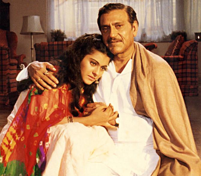 Amrish Puri as Chaudhary Baldev Singh, Simran's father: Baldev lived in London but his heart belonged in Punjab. He has given several iconic scenes in the film - be it smelling Ajit's letter (his friend from India) as the same reminds him of his homeland, or the store sequence with Raj and friends, the 'Aao Aao' pigeon feeding scene or the unforgettable climax of DDLJ, when after getting a go-ahead from strict dad, Simran risks her life to catch a moving train to be with her lover Raj. Puri nailed it with his commanding and intimidating aura with his baritone and demeanour. Remembered for nailing villainous roles with his exceptional acting, the 'Mogambo' of Bollywood has more than 400 films to his credit. He passed away in 2005 at age 73.