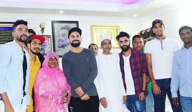 The following year in January, Mohammed Siraj was purchased by VIrat Kohli's Royal Challengers Bangalore and has not looked back since.
In picture: When Mohammed Siraj and family invited Virat Kohli and Indian cricketers home. 