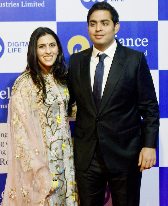 In August 2019, Akash and Isha Ambani were spotted at the 42nd AGM of Reliance Industries held at South Mumbai. While Akash walked in with his wife Shloka Mehta, Isha graced the event with her grandmother Kokilaben Ambani.
In picture: Akash looked smart in a black suit, while Shloka stole the show with her floor-length floral ethnic ensemble.