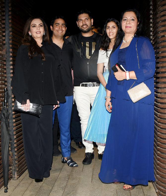 In picture: Nita Ambani, Akash Ambani and Shloka Mehta pose for a picture during cricketer Yuvraj Singh's retirement bash in Mumbai.