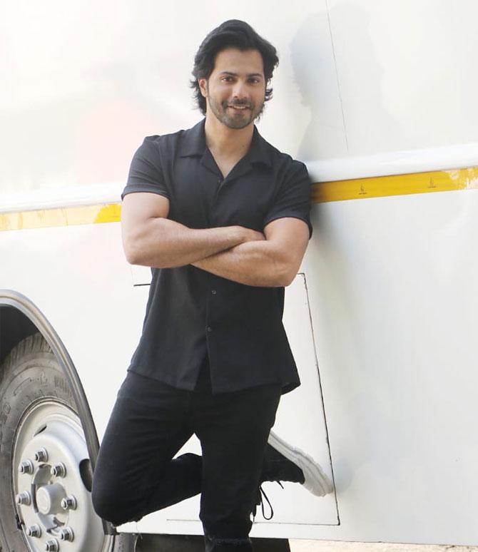 Varun Dhawan looked dapper in his black shirt and matching pants as he posed for the photographers ahead of shooting for the Kapil Sharma show. Coolie No 1 is a remake of 1995 comic caper of same name which starred Govinda and Karisma Kapoor.