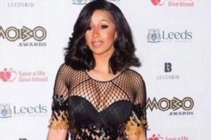 Cardi B's husband briefly detained after driving past rally