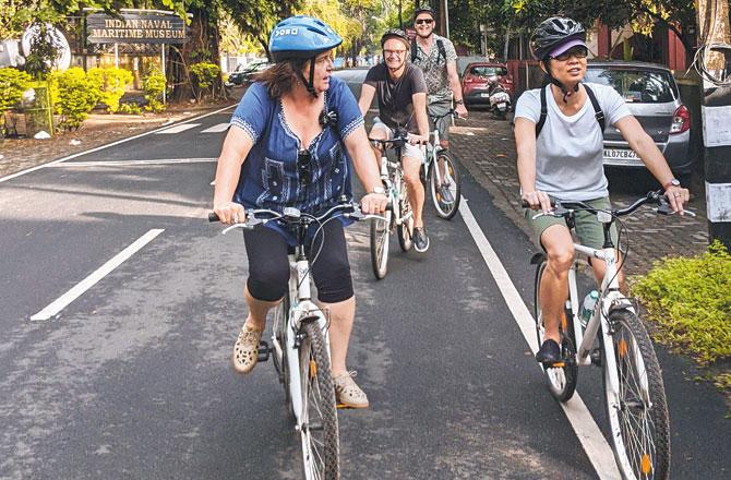 Travellers during a cycle tour organised by Gully Tours to Fort Kochi