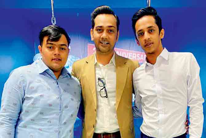 Third-generation owner, Raashid Hakim (centre) with (right) nephew Wajahat and (left) son Daanish
