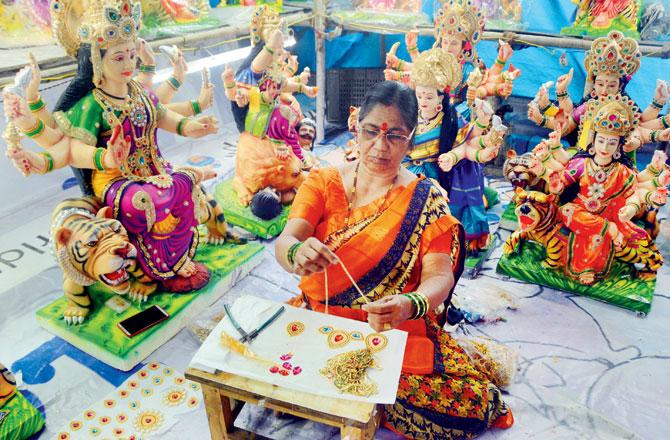 Idol maker Jayashree Mhatre who sells murtis from her Malad warehouse, says despite COVID-19, the demand for her murtis has been consistent as women associate the Amba murti with a sense of power