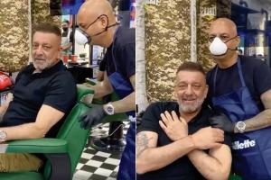 Sanjay Dutt gets a haircut, says, 'will be out of this cancer soon'