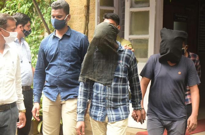 Some of the TRP scam accused leave the Esplanade court at Azad Maidan after a hearing on October 26. Pic/Suresh Karkera