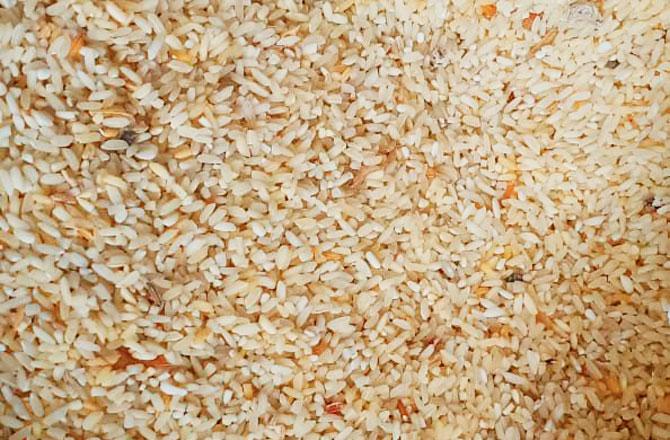 The worm-infested rice was re-polished for further distribution among tribals