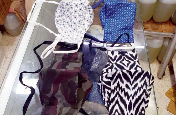 Shopkeeper Surendra Dugar says cotton masks are more comfortable