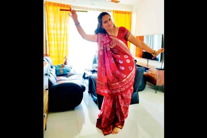 Movement therapist Riddhi Doshi says wearing a heavy ghagra-choli at home might be tiring. Instead, a light, attractive kurta with cotton palazzos (glitter trimmings) with dupatta, or bandhani saree works better