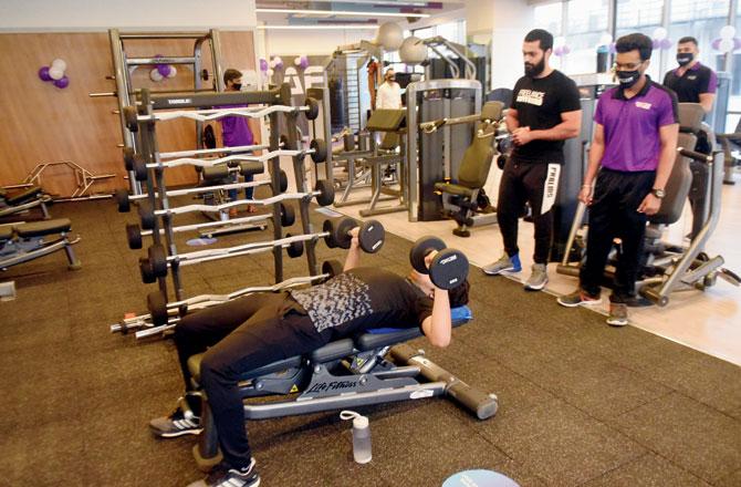 Members work out at Anytime Fitness Kemps Corner on Monday. Pic/Sameer Markande