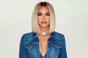 Khloe Kardashian shares she is COVID-19 positive