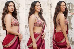 Kiara oozes oomph in a magenta pink saree for the promotional event